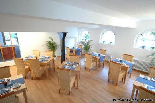 Apartment Hotel Констанц Ресторант снимка